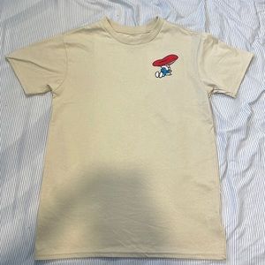 Never worn Smurf shirt tan color